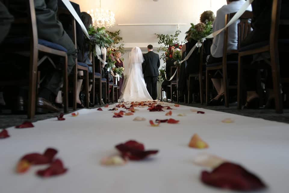 bride and groom on the aisle