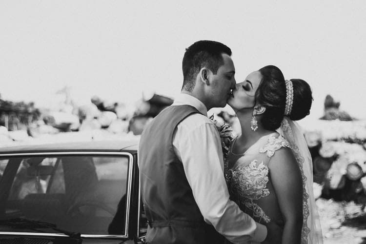 bride and groom kiss