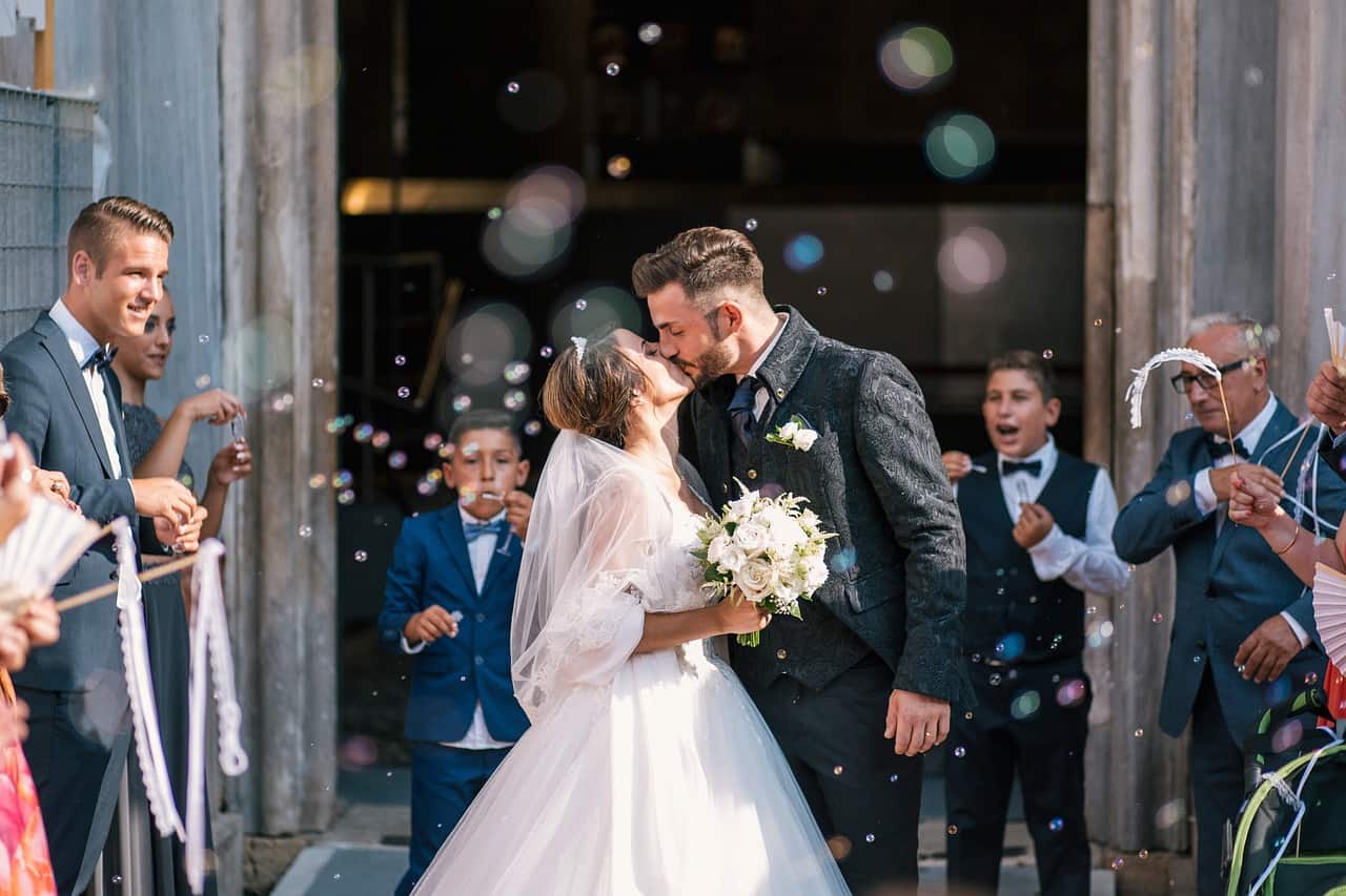 kissing couple after the wedding ceremony