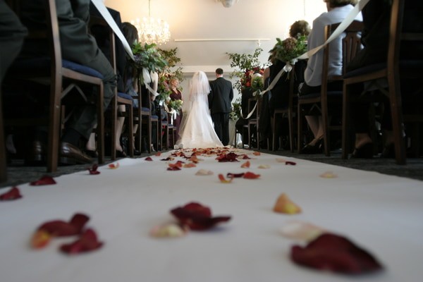 bride and groom walking down the aisle